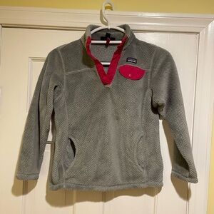 Size 10.  Girls' Re-Tool Snap-T Pullover fleece. Pink and gray